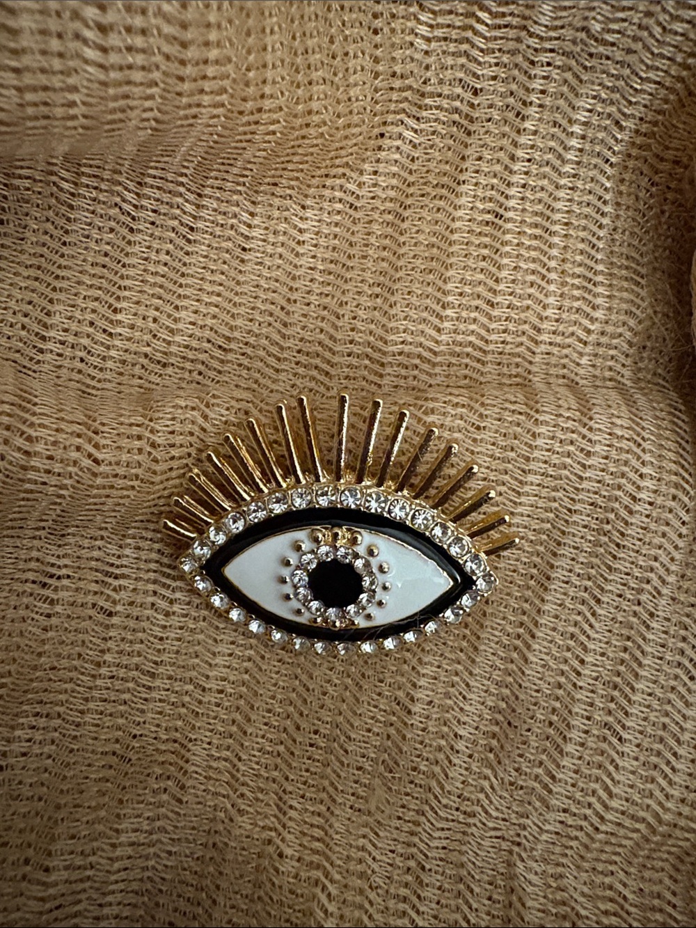 Gold and White Evil Eye Brooch with Crystal Accents